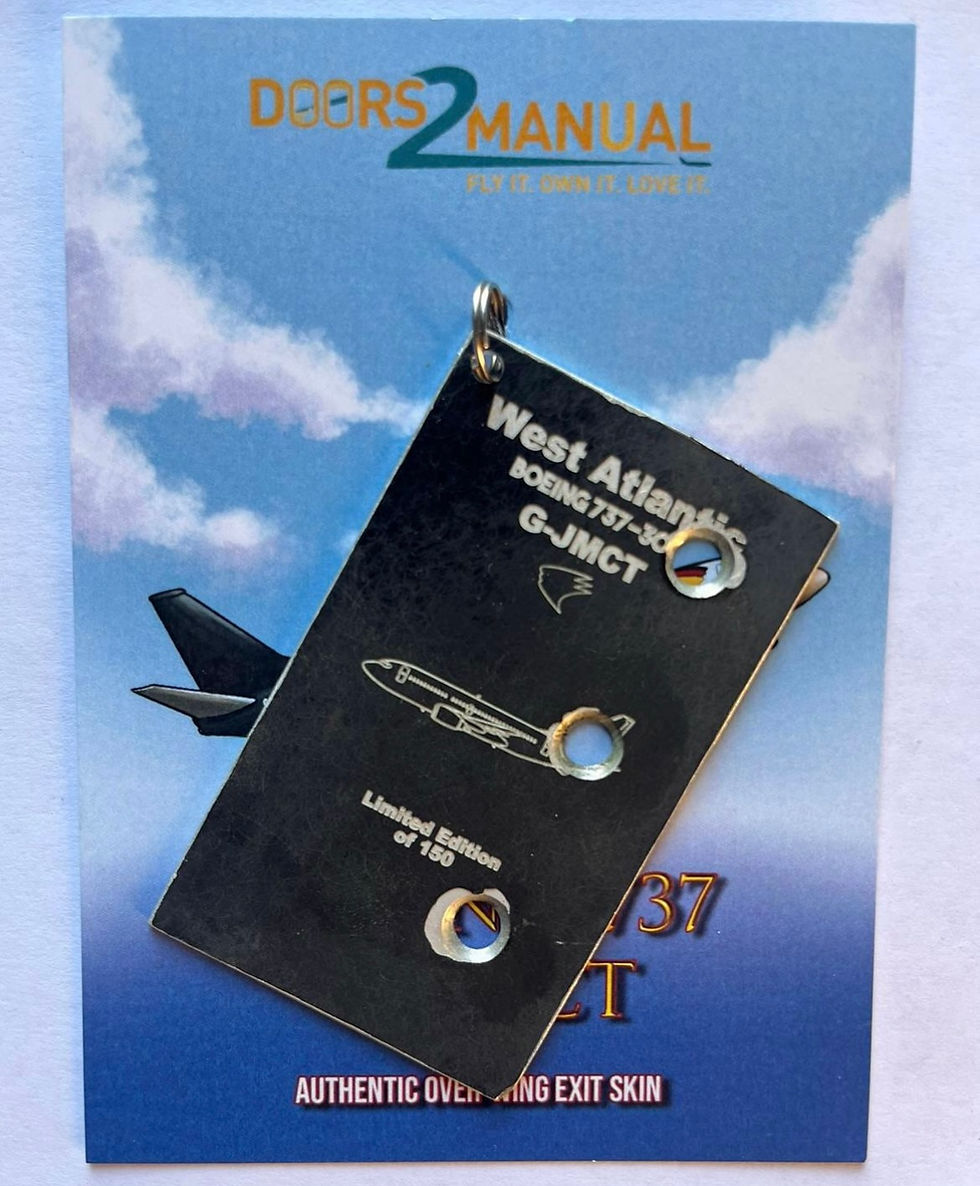 West Atlantic Boeing 737-300 G-JMCT emergency overwing exit door skin tag