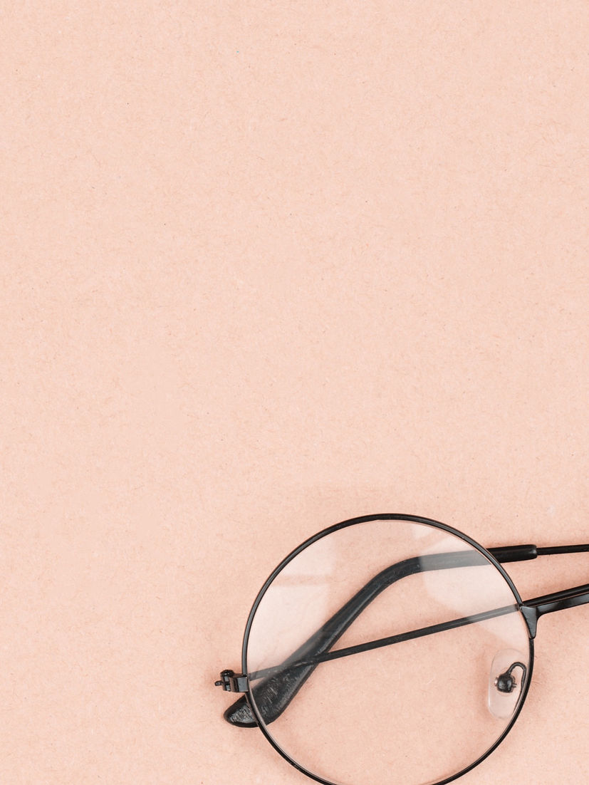 Round hipster sunglasses on pink background_edited.jpg