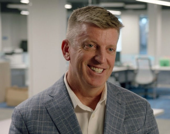 Entrepreneur smiling at camera