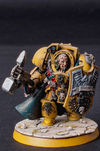 Miniature of Imperial Fist Captain Darnath Lysander. Metal vintage warhammer 40k model painted by artist Hawk Talon.