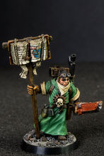 Imperial missionary sculpted by Brian Nelson. It is a Warhammer 40k miniature from 1998 Citadel catalogue, out of production pro-painted metal figure by the artist Hawk Talon.