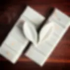 petrichor wax melt snap bars on a wooden board with two leaf shaped wax melts