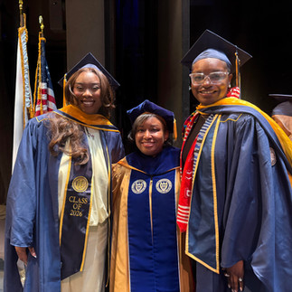Akirah, Dr. Ivey, and Jasmine at African American Studies Graduation
