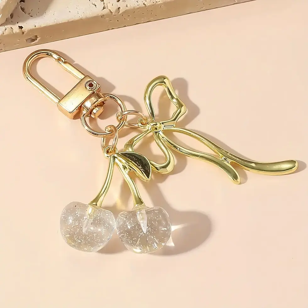 Thumbnail: Golden Crystal Keychain with Bow Pendant Design