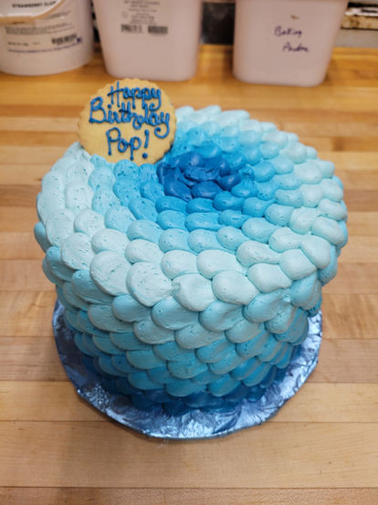 Blue ombre birthday cake with "Happy Birthday Pop!" text 