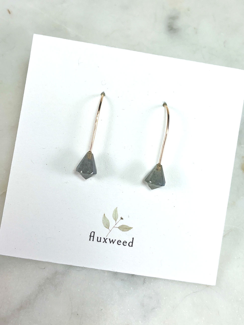faceted labradorite drops on gold earring wires on earring card