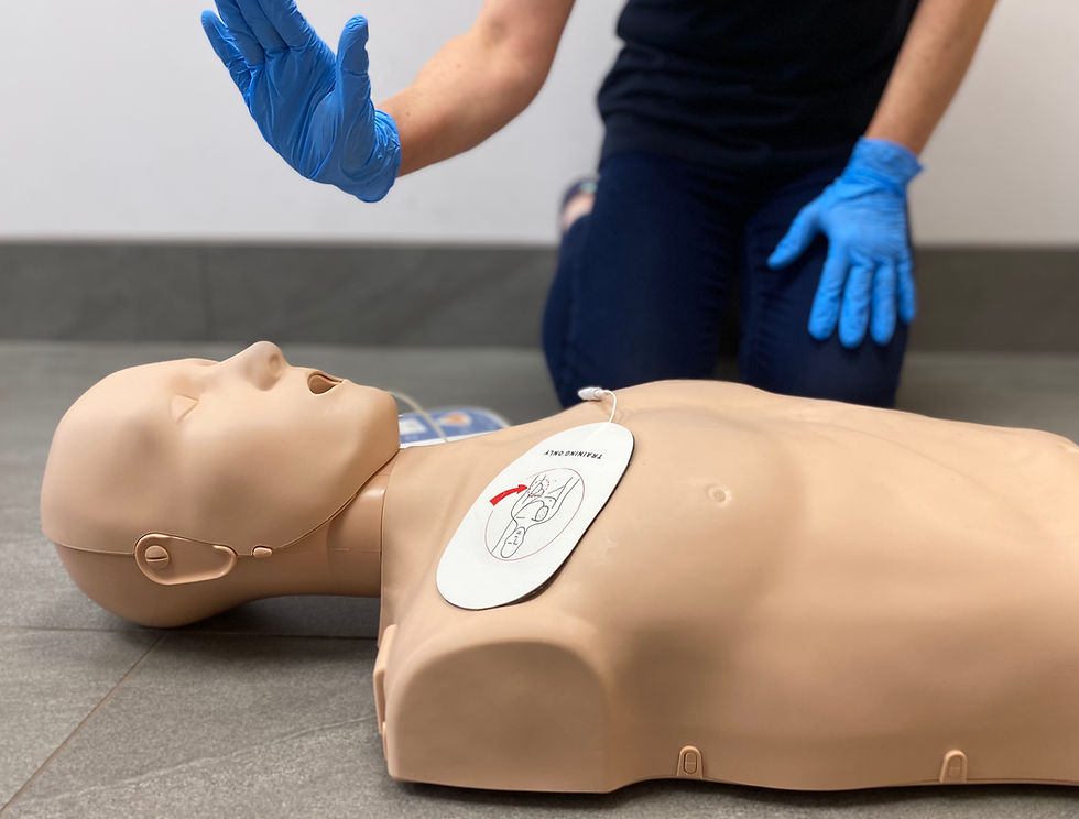 First aid being performed on a dummy