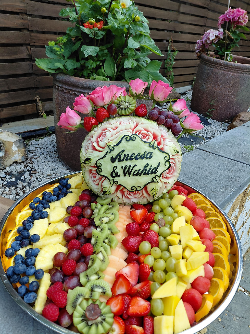 Intricate watermelon carving showcasing floral designs