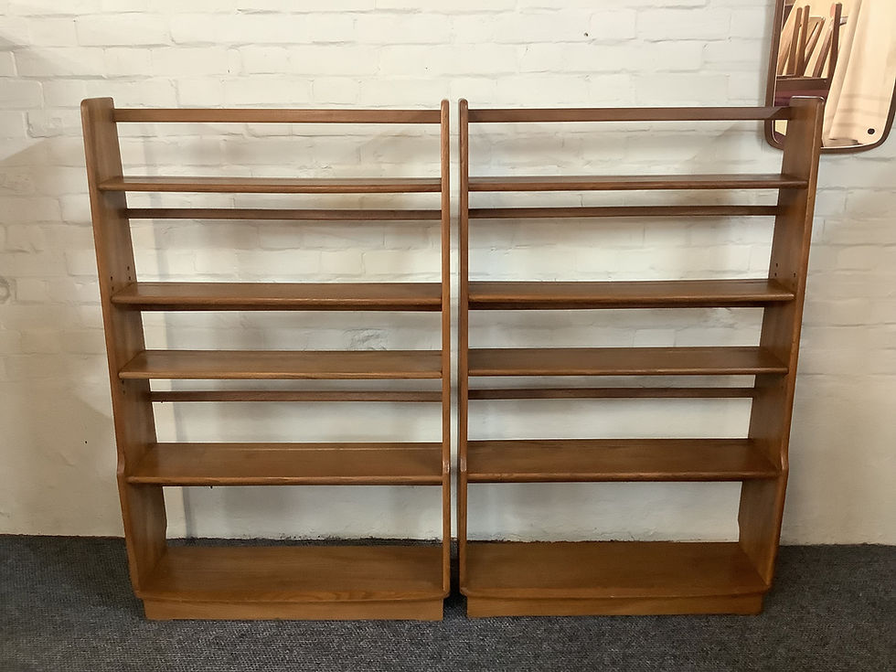 Thumbnail: Two Matching Ercol Waterfall Open Bookshelves