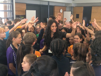Kimberly Moore talks to students in Perth, Australia about the Power of Giving!