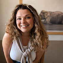 Integrative-counsellor-Durham-sasha-portrait-smiling-leaning-elephant-picture.png