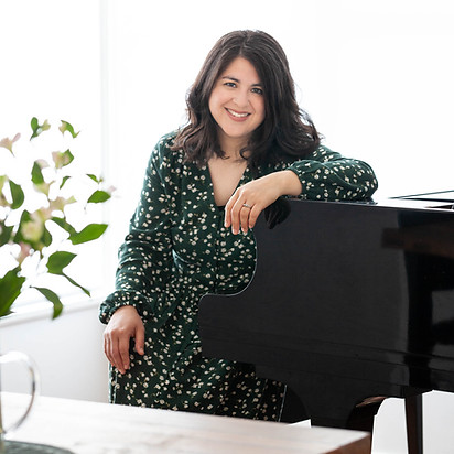 Hawke's Bay musician Natalie Meszaros smiling at the piano