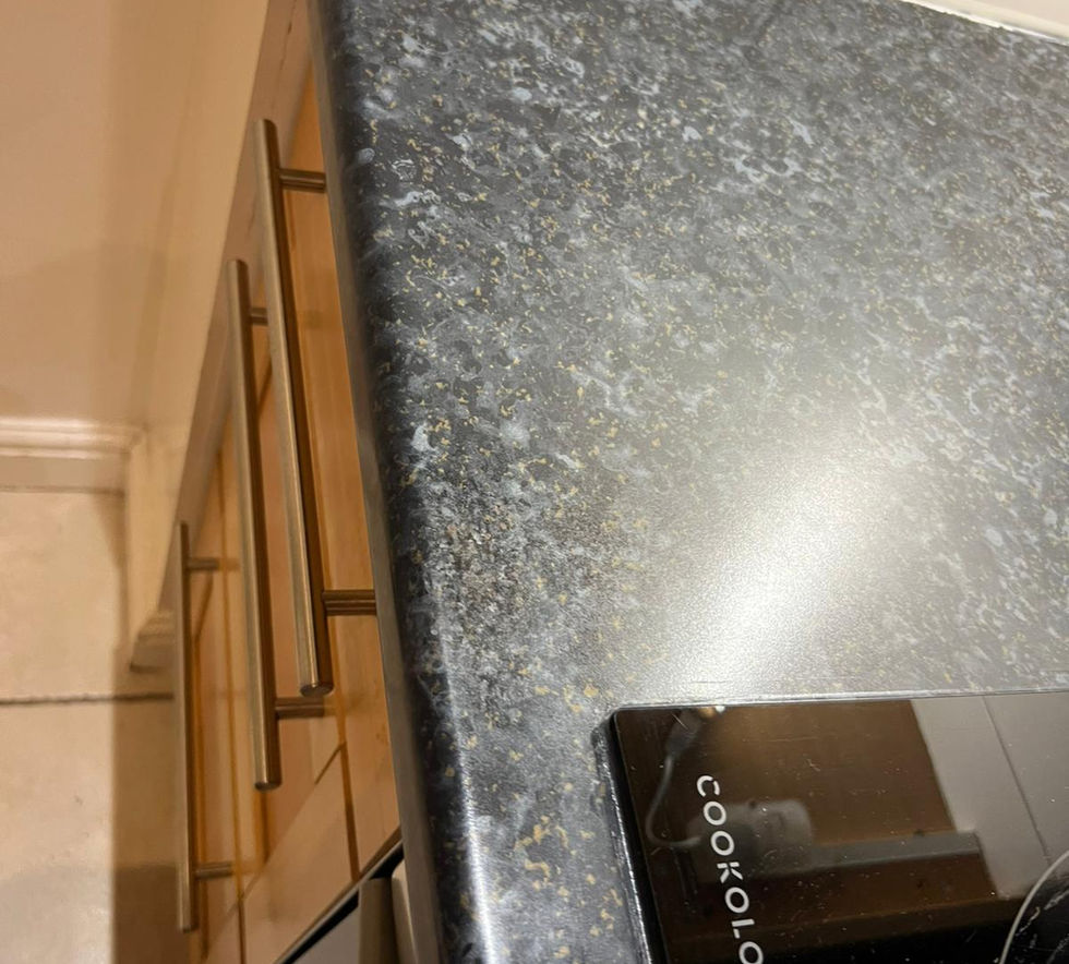 Repaired laminate kitchen worktop after restoration London