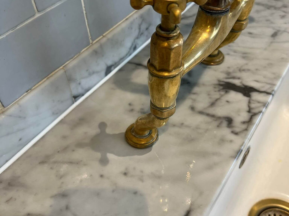 restored marble worktop after crack repair near tap
