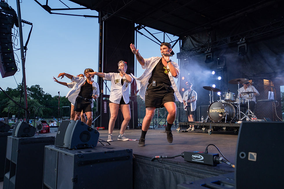 Live band performing on stage at Coppell's Freedom Fest Independence Day celebration