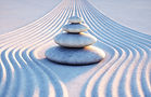 Stacked stones in sand_Homepage.jpeg