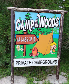 Camp At The Woods logo