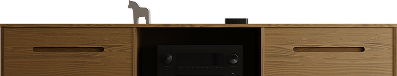 Modern wooden TV stand with open shelf and audio equipment.