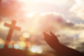 Praying Hands and a Cross