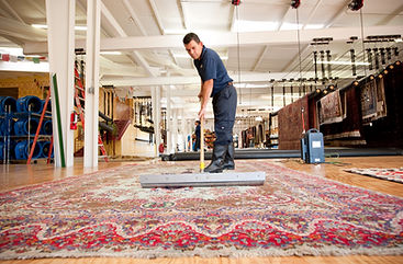 sweeping-an-area-rug-4256x2832.jpg