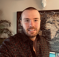 A headshot of Kori in his studio.