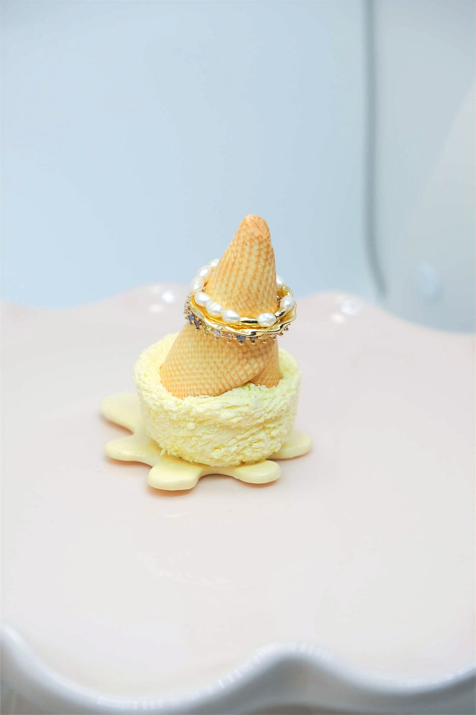 Thumbnail: Handmade melted ice cream ring holders in three colors.
