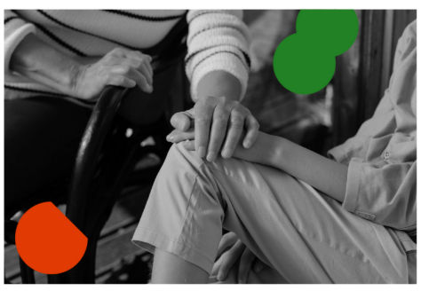 black and white photo of one person's hand on another's, with branded coloured icon overlay