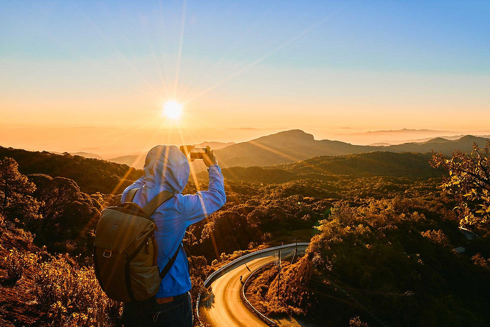 backpacker-taking-a-photo-landscape-view-with-sunr-2023-11-27-04-56-25-utc.jpg