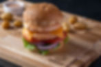 Shrimp Society premium frozen shrimp burger patties in vacuum-sealed packaging