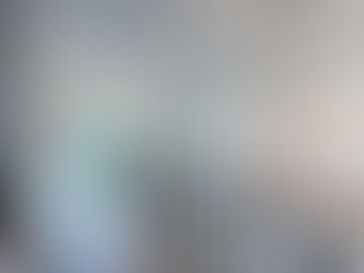 An image of a home staircase and  beautiful chandeliers by Evolution General Contracting.