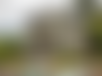 Contractors installing energy-efficient windows on a Craftsman-style house with an overlay of a rising financial growth chart, symbolizing home value appreciation through renovation.