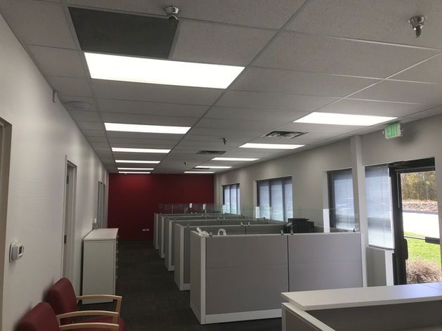Ceiling lights installed inside an office building.