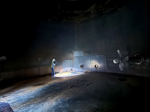 Engineer working in a confined space at an industrial facility
