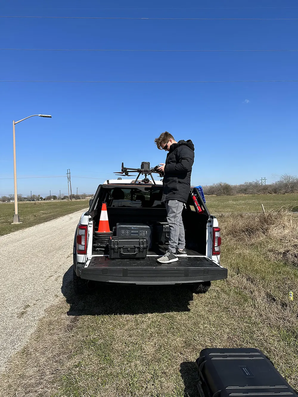 Engineer onsite flying a drone