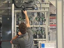 Engineer Laser Scanning a Hydrogen Production Skid