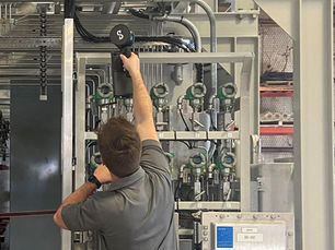 Engineer Laser Scanning a Hydrogen Production Skid