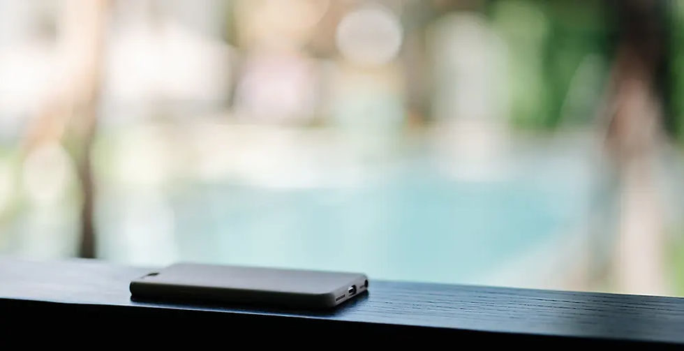 Phone Facing Down at a Pool