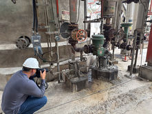 Engineering Taking Photo of Spring Can in a Refinery