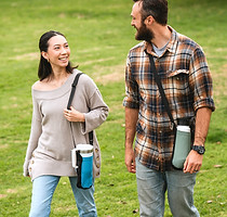 Friends walking with thier Chicobag Water Botle Sling