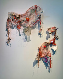 Catch and Release 2024 gauze, encaustic, fishing line, bobbers, assorted trash 32 x 34