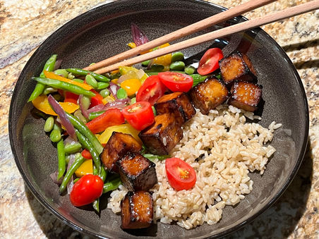 a grain and veggie bowl with sear tofu
