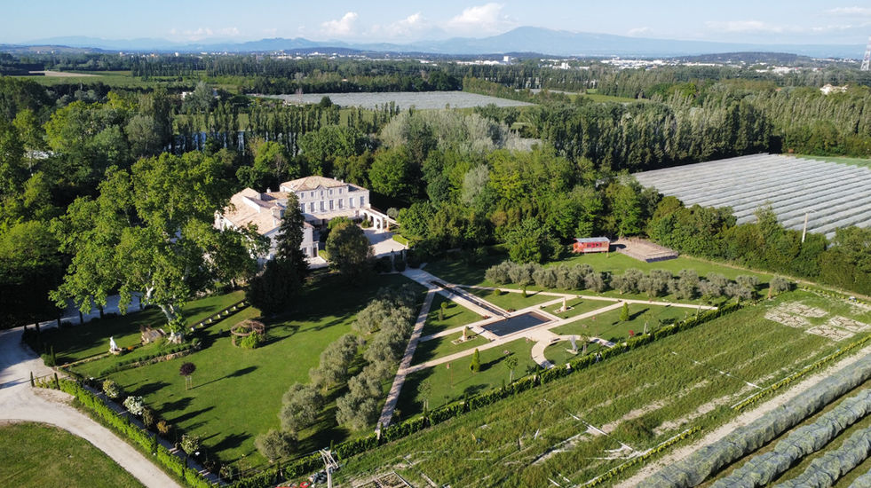 18th-century Provençal château surrounded by formal French gardens.