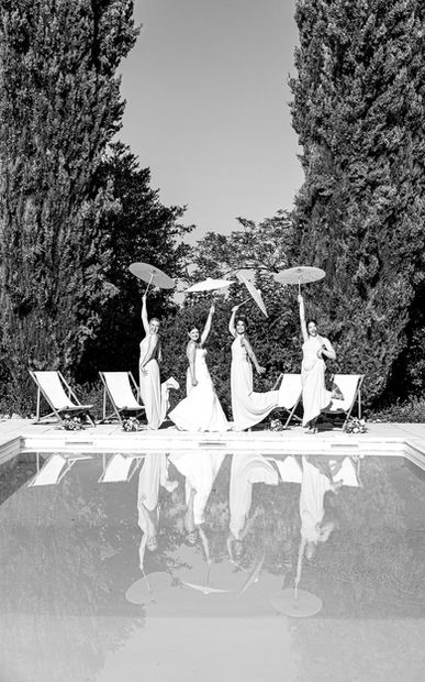 Parasols by the pool - Stylish Manor House wedding venue in the Charente