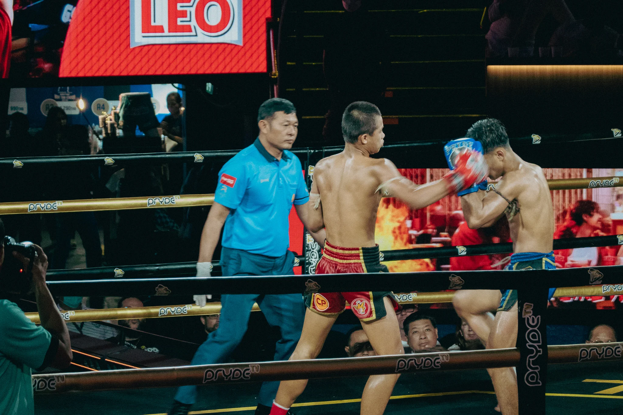 Muay Thai Fighters in combat in the ring