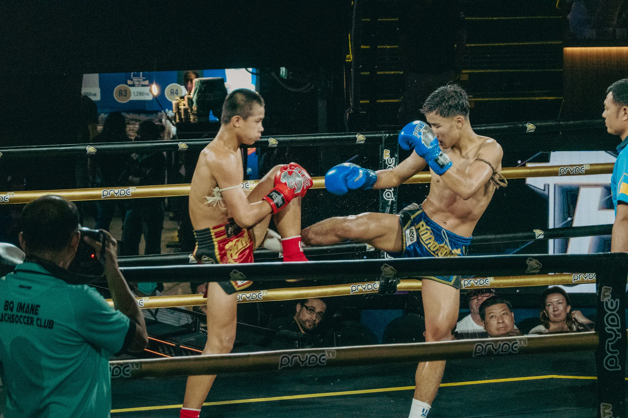 Muay Thai Fighters in combat in the ring