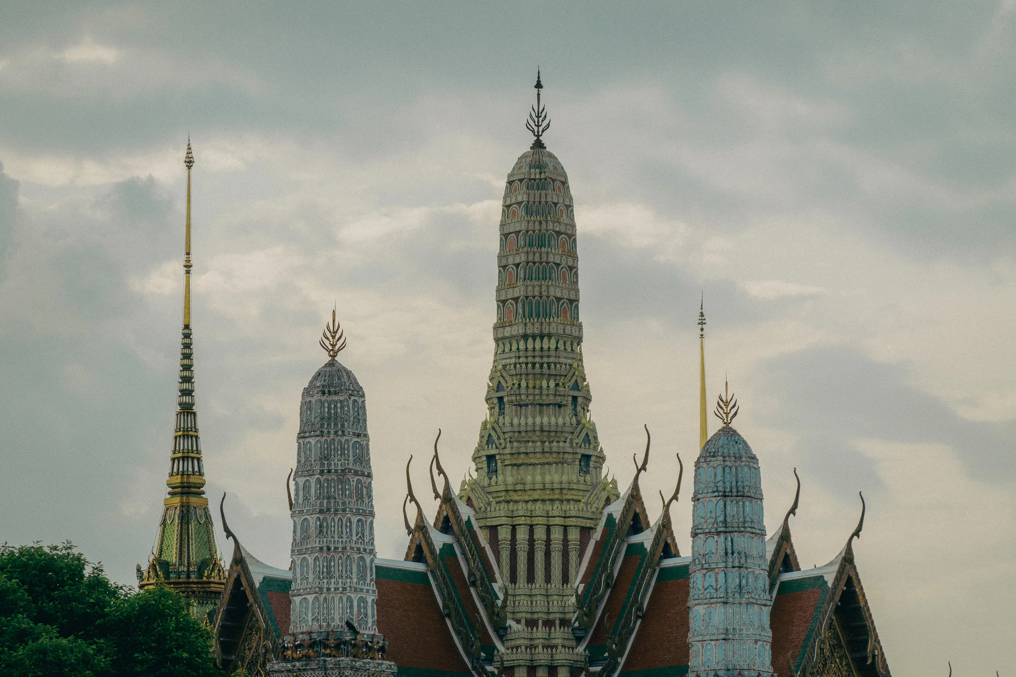Large gold and white traditional Thai castle towers