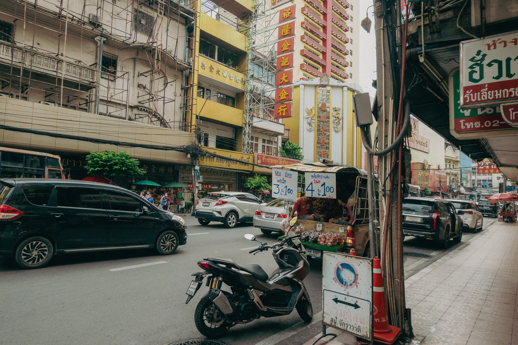 City street with motor scooter in Bangkok Thai Food