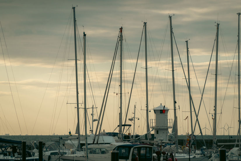 Sailboat masts at sunset at Skanör Marina in Sweden