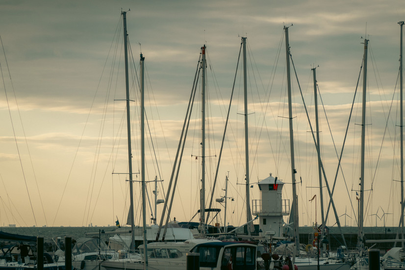 Sailboat masts at sunset at Skanör Marina in Sweden
