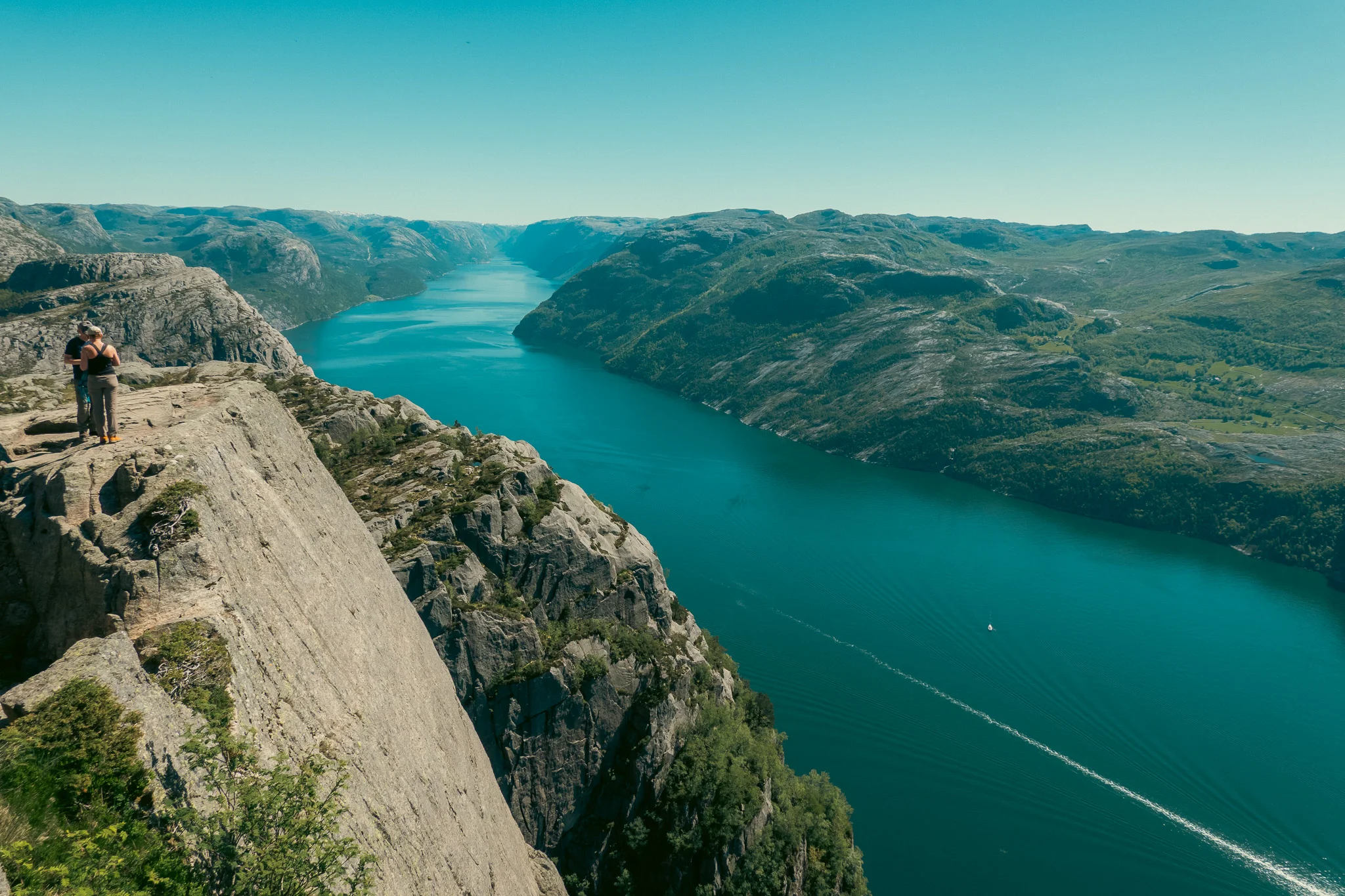 A fjord running through the mountains in Norway.